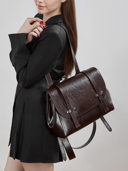 The Oil-Waxed Genuine Leather Convertible Flap Backpack Shoulder Bag