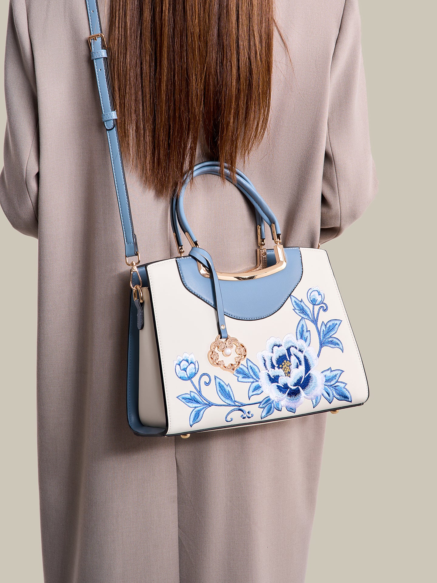 Elegant Peony Embroidered Vegan Eco-Leather Clutch Bag with Charm