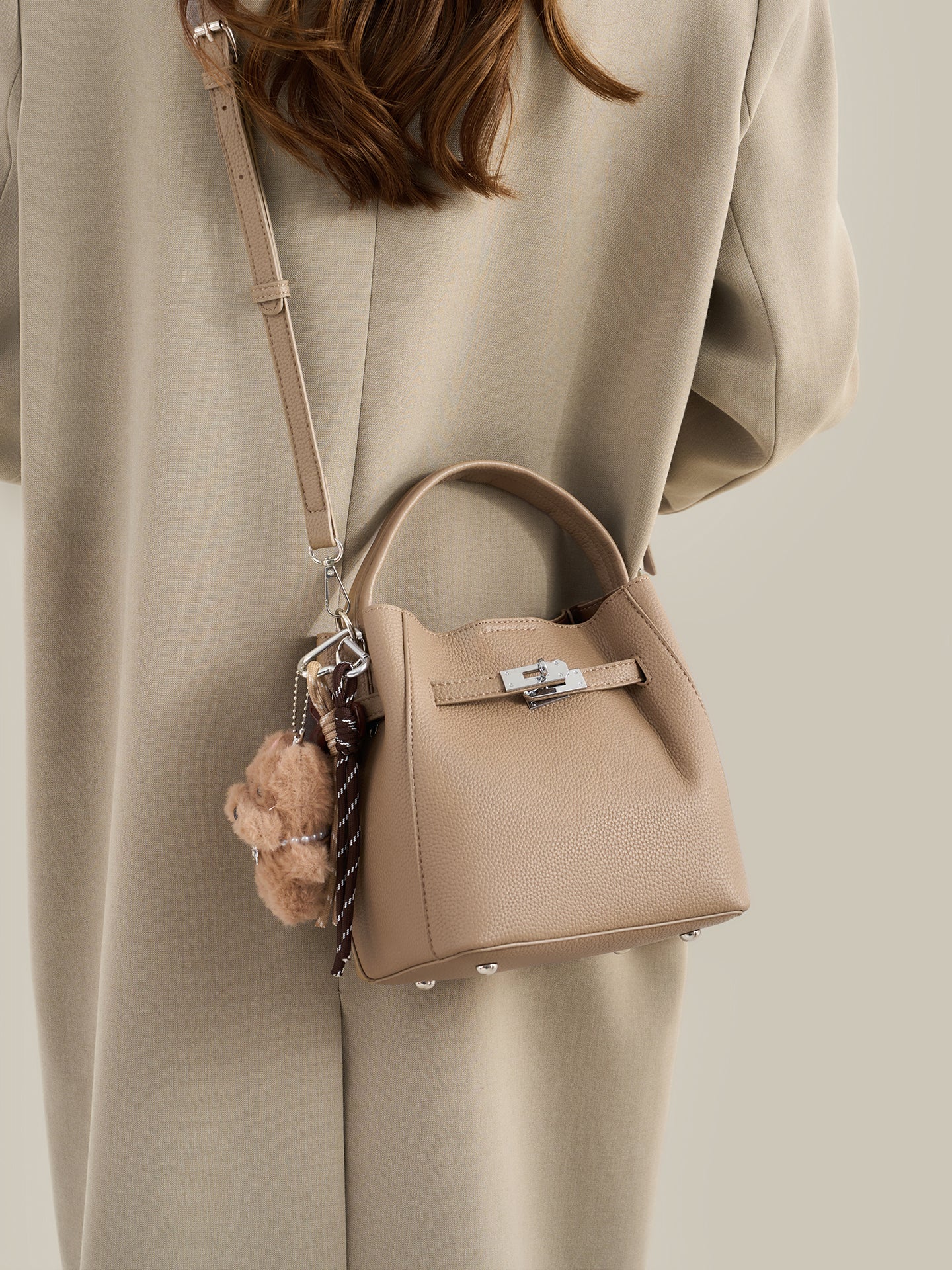 Mellow Pebble Textured Vegan Eco-Leather Bucket Bag with Fluffy Puppy Charm