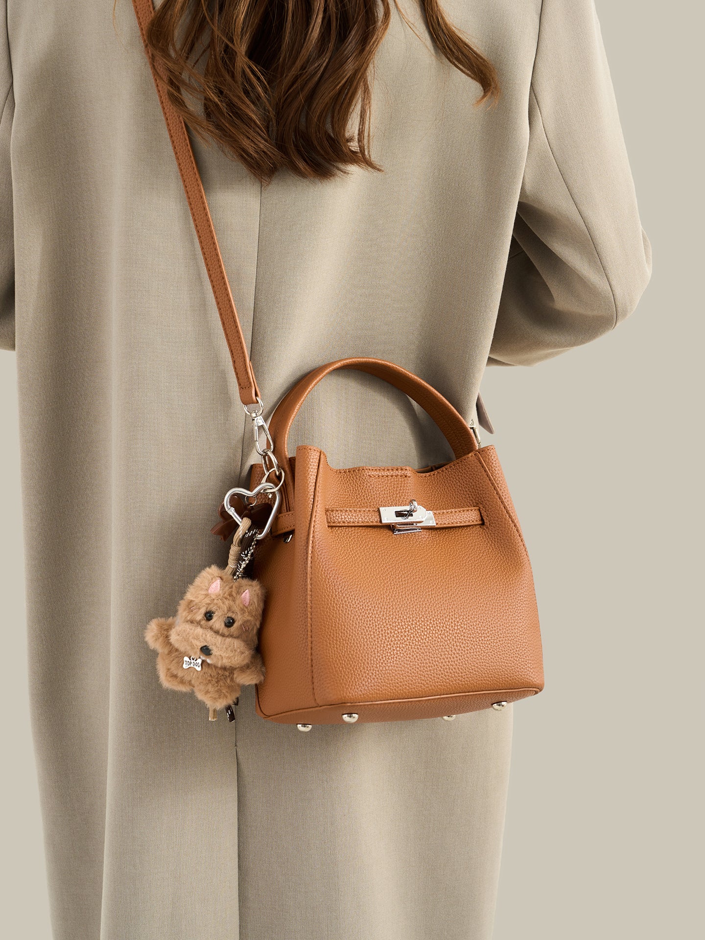 Mellow Pebble Textured Vegan Eco-Leather Bucket Bag with Fluffy Puppy Charm