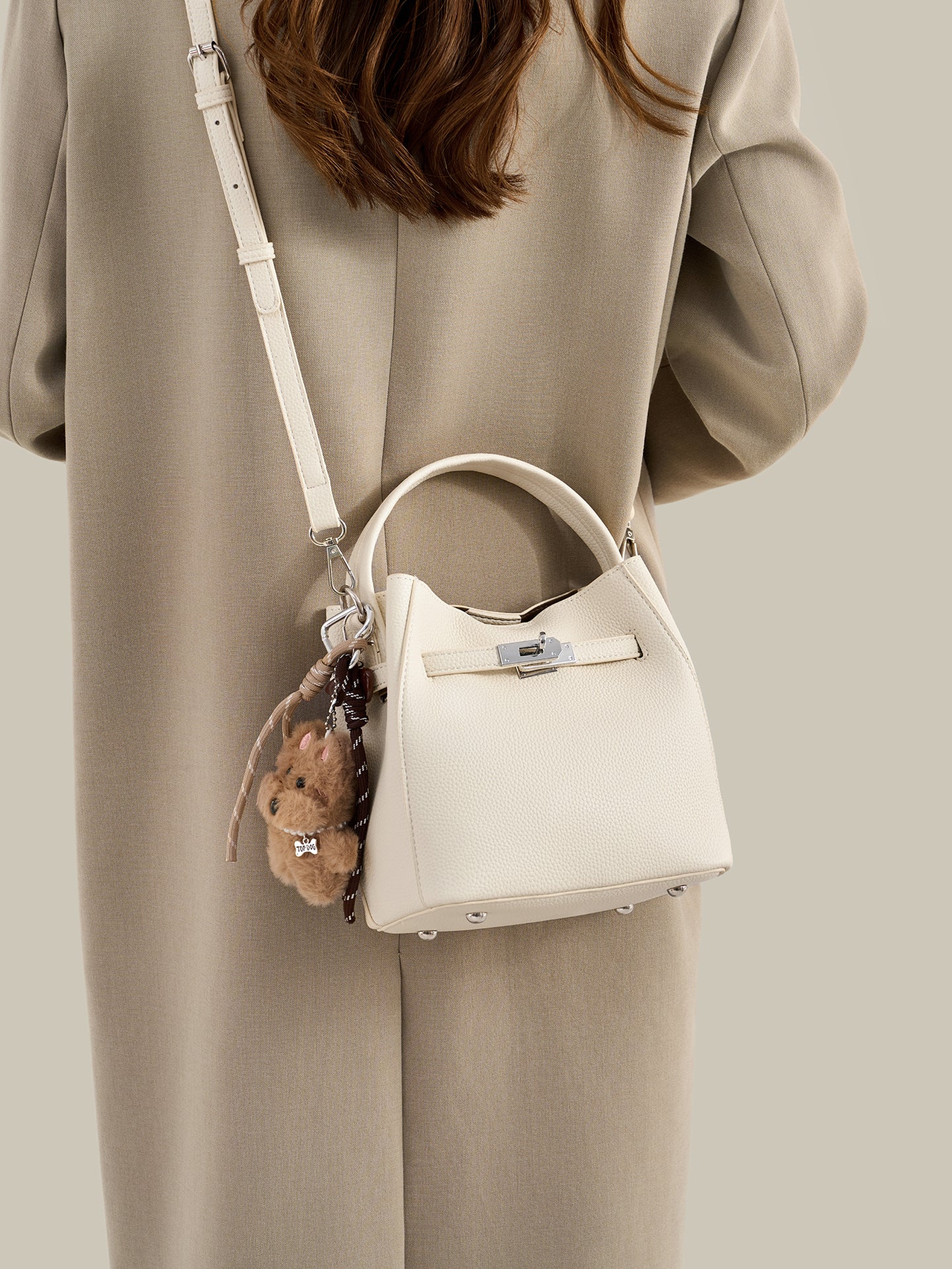 Mellow Pebble Textured Vegan Eco-Leather Bucket Bag with Fluffy Puppy Charm