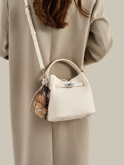 Mellow Pebble Textured Vegan Eco-Leather Bucket Bag with Fluffy Puppy Charm