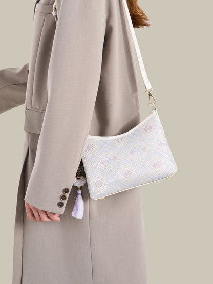 Graceful Geometric Vegan Eco-Leather Clutch Bag with Tassel Charm