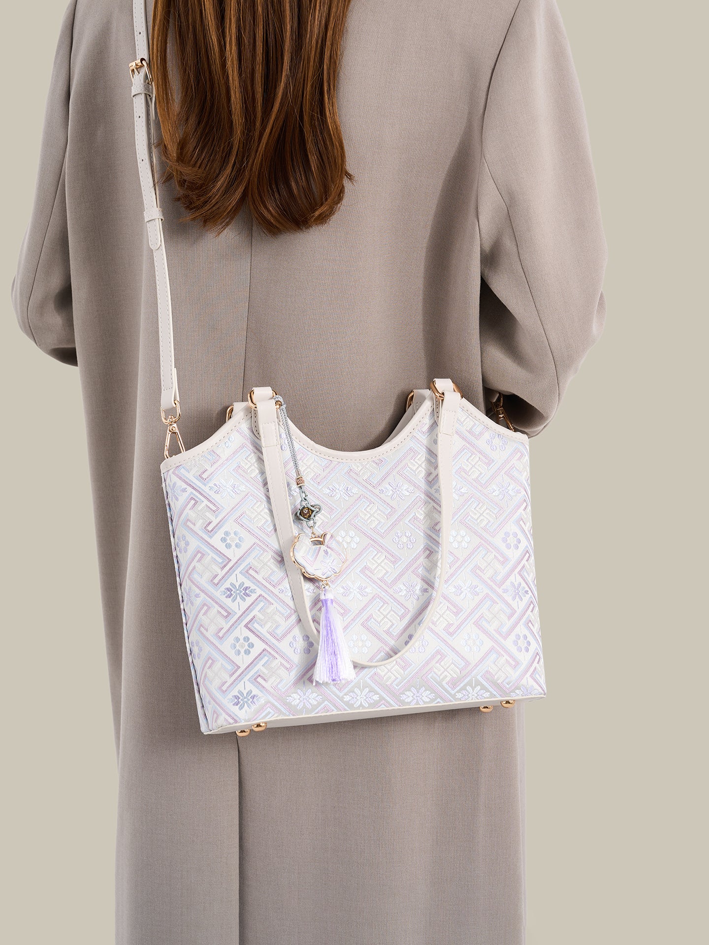 Refined Brocade Vegan Eco-Leather Tote Clutch Bag with Intricate Tassel Charm