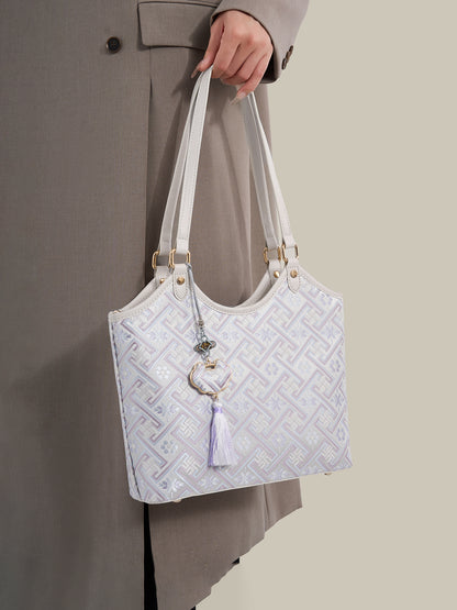 Refined Brocade Vegan Eco-Leather Tote Clutch Bag with Intricate Tassel Charm