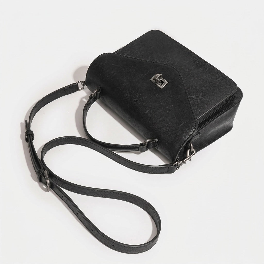 Pochette messenger retrò a busta geometrica in vera pelle