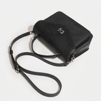 Pochette messenger retrò a busta geometrica in vera pelle