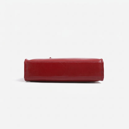 Vintage-Clutch aus glänzendem veganem Öko-Leder mit Herzanhänger