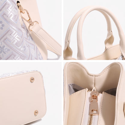 Bolso satchel de mano elegante de ecocuero vegano con estampado jacquard y adorno de cierre calado