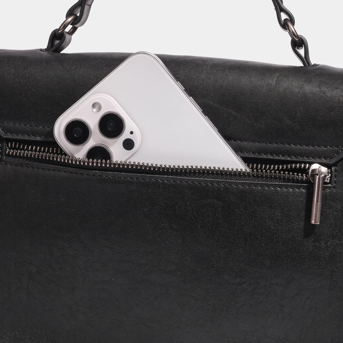 Pochette messenger retrò a busta geometrica in vera pelle