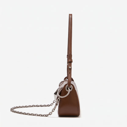Bolso baguette minimalista de cuero genuino liso con hebilla plateada