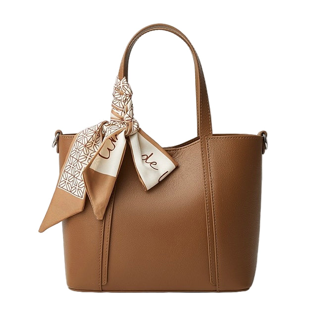Brown handbag with a decorative scarf on a white background