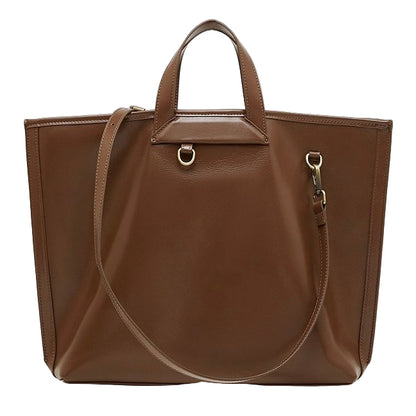 Brown leather tote bag on a white background