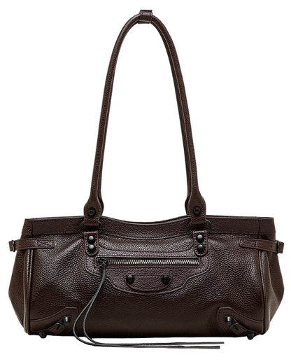 Brown leather handbag with a shoulder strap on a white background