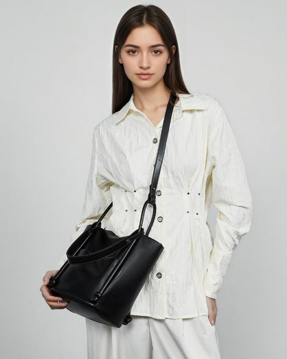 Bolso tipo cubo de cuero genuino para mujer con detalle de nudo color camello