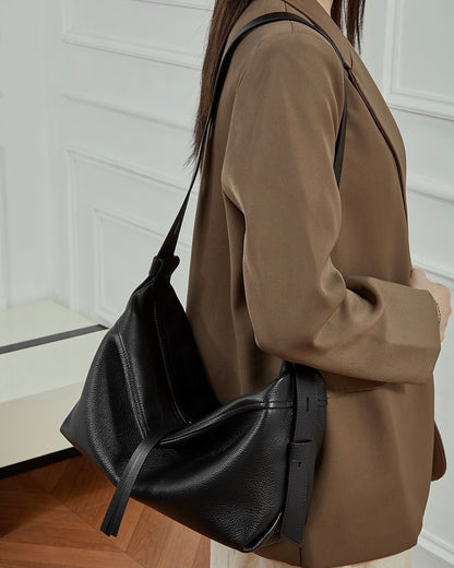 Women's Genuine Pebbled Leather Crescent Bag with Tassel Accent