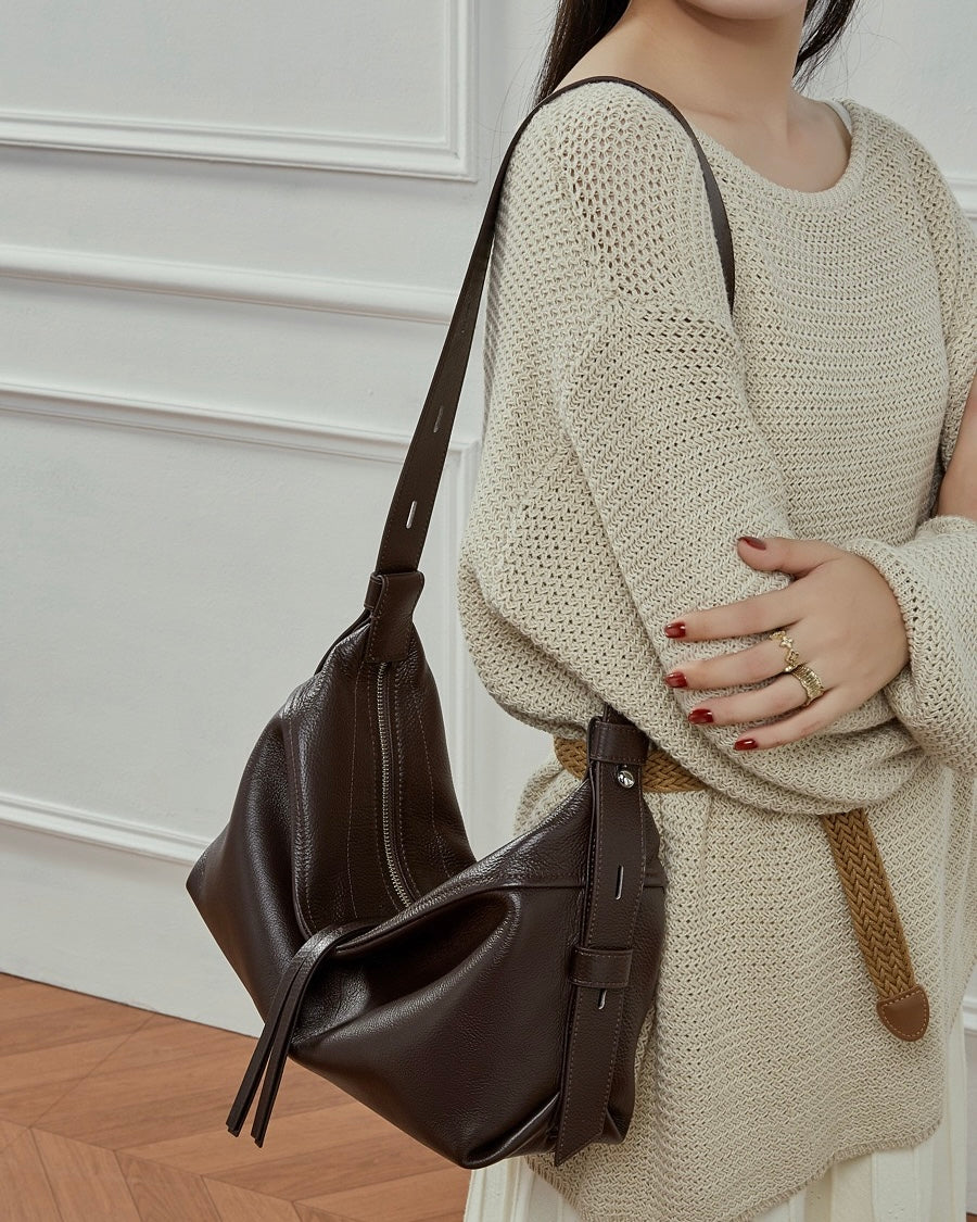 Women's Genuine Pebbled Leather Crescent Bag with Tassel Accent