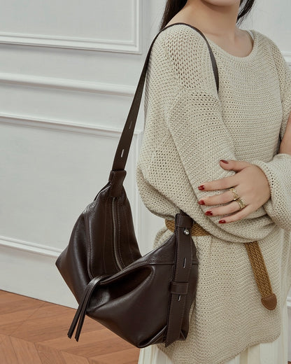 Women's Genuine Pebbled Leather Crescent Bag with Tassel Accent