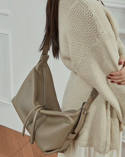 Women's Genuine Pebbled Leather Crescent Bag with Tassel Accent