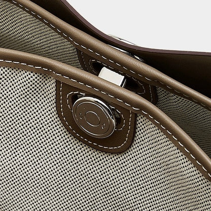 Bolso de mano Lumina para mujer de cuero genuino con forma de cúpula