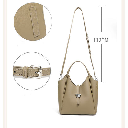 Damen-Umhängetasche aus echtem Leder mit Tragegriff oben im minimalistischen Stil