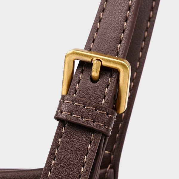 Bolso tipo cubo para mujer de ante de cuero ámbar