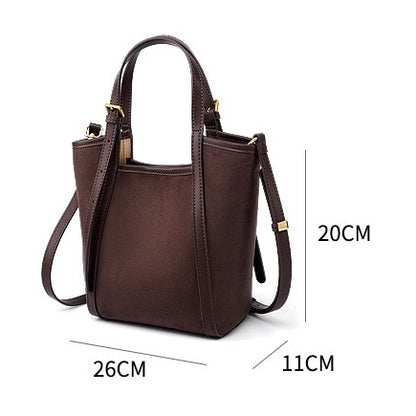 Bolso tipo cubo para mujer de ante de cuero ámbar