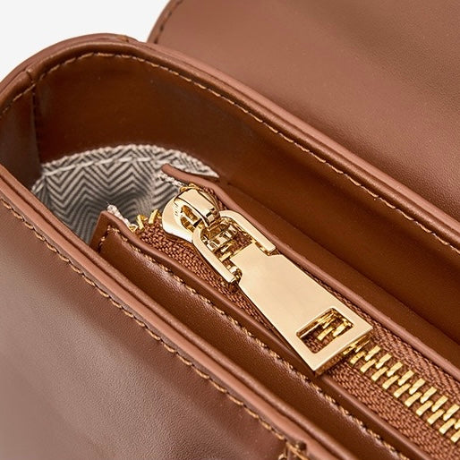 Damenhandtasche aus echtem Leder mit Hufeisenschnalle 