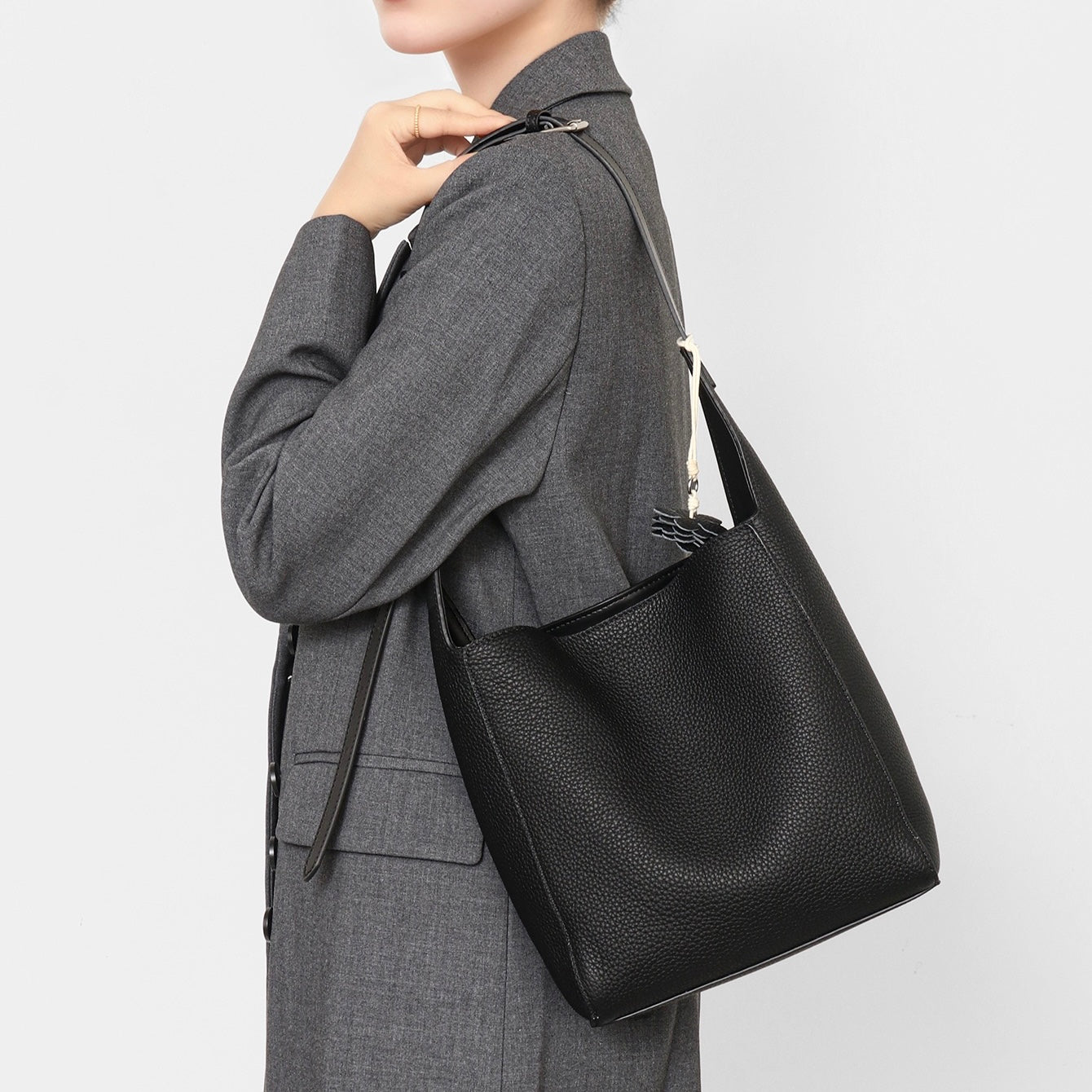 Textured Genuine Leather Hobo Bag with Floral Charm