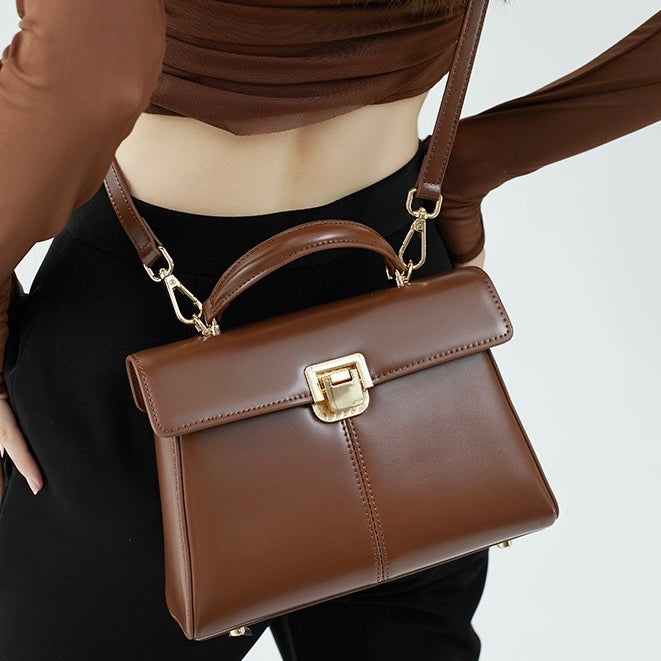 Damenhandtasche aus echtem Leder mit Hufeisenschnalle 