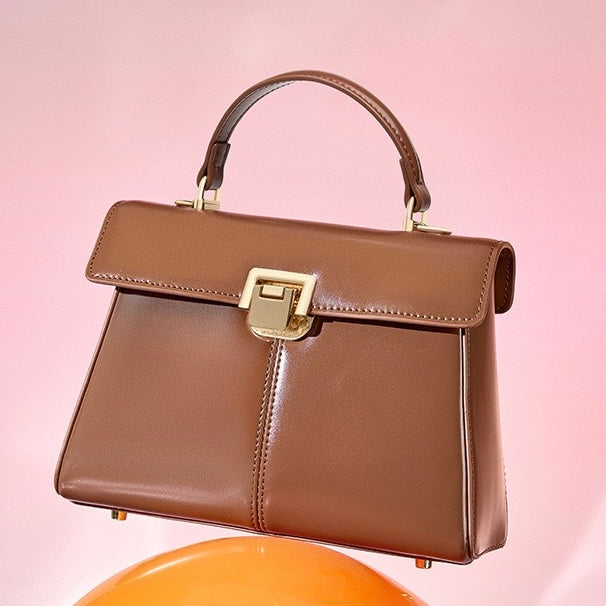 Damenhandtasche aus echtem Leder mit Hufeisenschnalle 