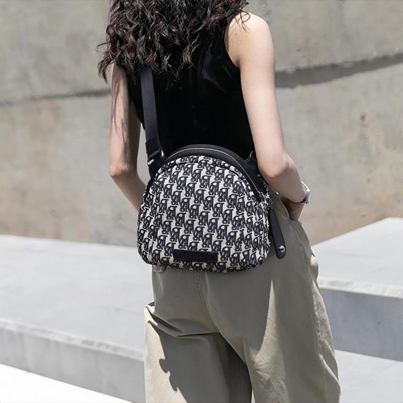 Monogram Jacquard Half-Moon Crossbody Bag