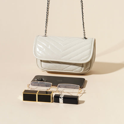 Damen-Mini-Flap-Tasche aus echtem Leder mit silberner Kette