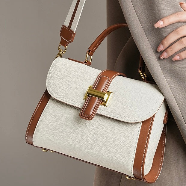 Strukturierte Umhängetasche aus echtem Leder für Damen mit Tragegriff oben im luxuriösen minimalistischen Stil