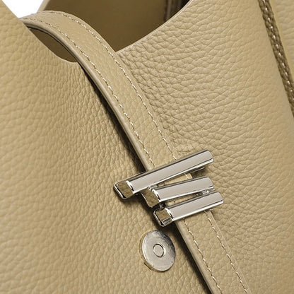 Damen-Umhängetasche aus echtem Leder mit Tragegriff oben im minimalistischen Stil