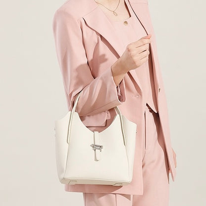 Damen-Umhängetasche aus echtem Leder mit Tragegriff oben im minimalistischen Stil