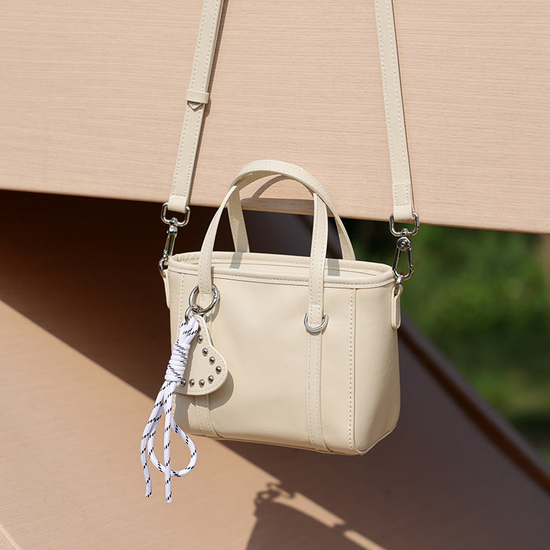 Sculpted Genuine Leather Mini Tote Crossbody Bag with Signature Heart Charm