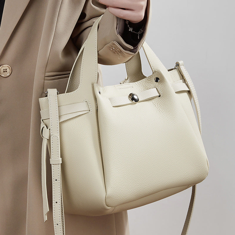 The Pebbled Genuine Leather Mini Bucket Tote Bag with Turn-Lock Closure
