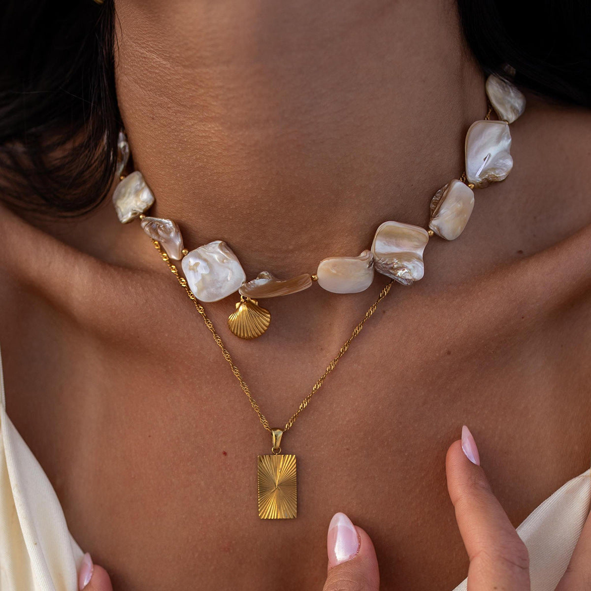 Collier pendentif en corde de coquillage de niche