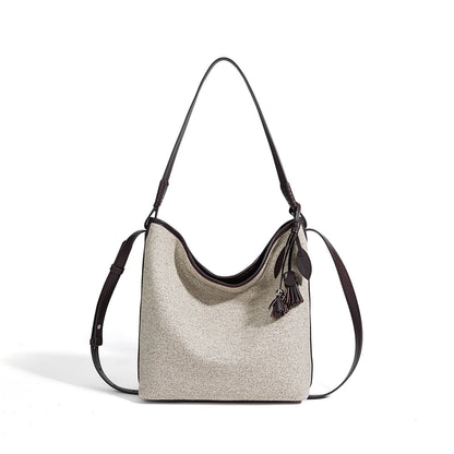 Slouchy Canvas Bucket Clutch Bag with Tassel Charm