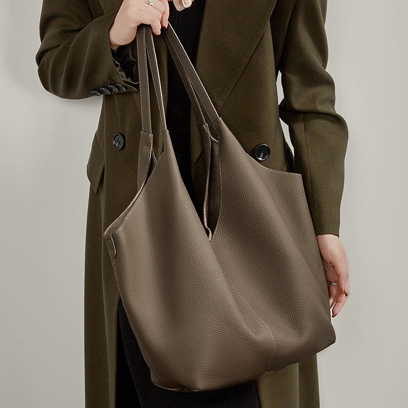 حقيبة إيثيرال في-كات جلد طبيعي | حقيبة هوبو بسيطة من جلد الحصى