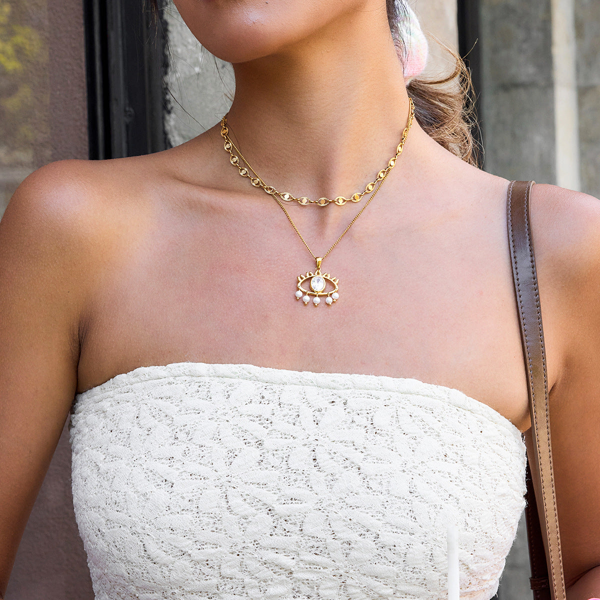 Vintage Halskette mit weißem Zirkon und Perlen, verziert mit dem bösen Blick 