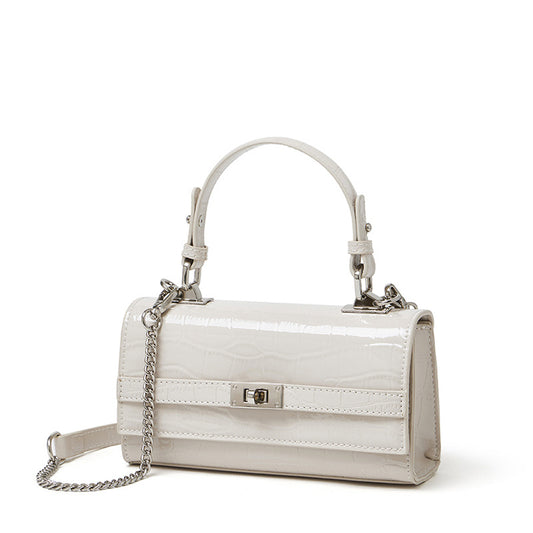 Bolso clutch sobre vintage de cuero genuino con acabado brillante tipo cocodrilo