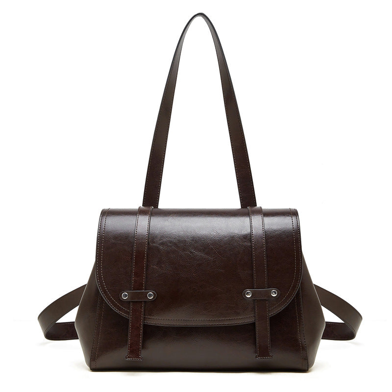 The Oil-Waxed Genuine Leather Convertible Flap Backpack Shoulder Bag