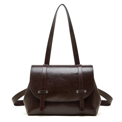 The Oil-Waxed Genuine Leather Convertible Flap Backpack Shoulder Bag