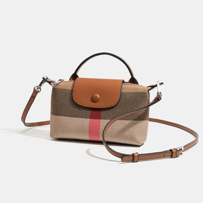 Bolso clutch bandolera de lona tejida con estampado clásico de cuadros británicos