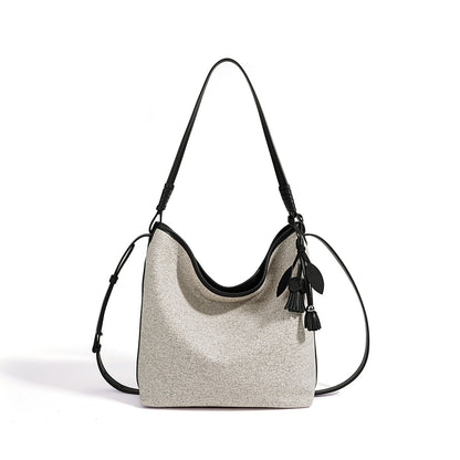 Slouchy Canvas Bucket Clutch Bag with Tassel Charm