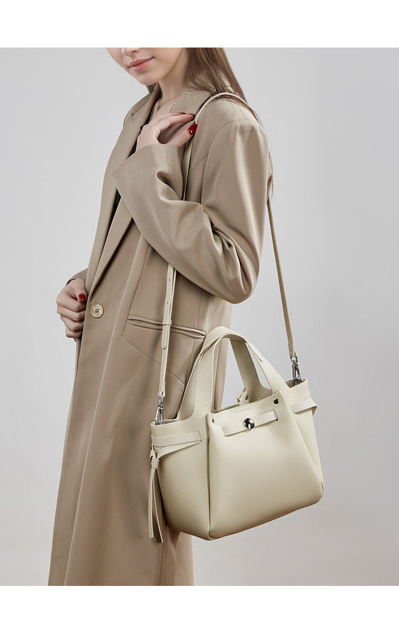 The Pebbled Genuine Leather Mini Bucket Tote Bag with Turn-Lock Closure