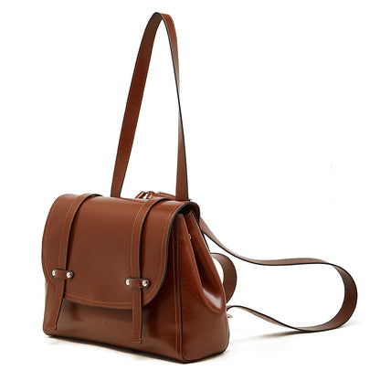 The Oil-Waxed Genuine Leather Convertible Flap Backpack Shoulder Bag