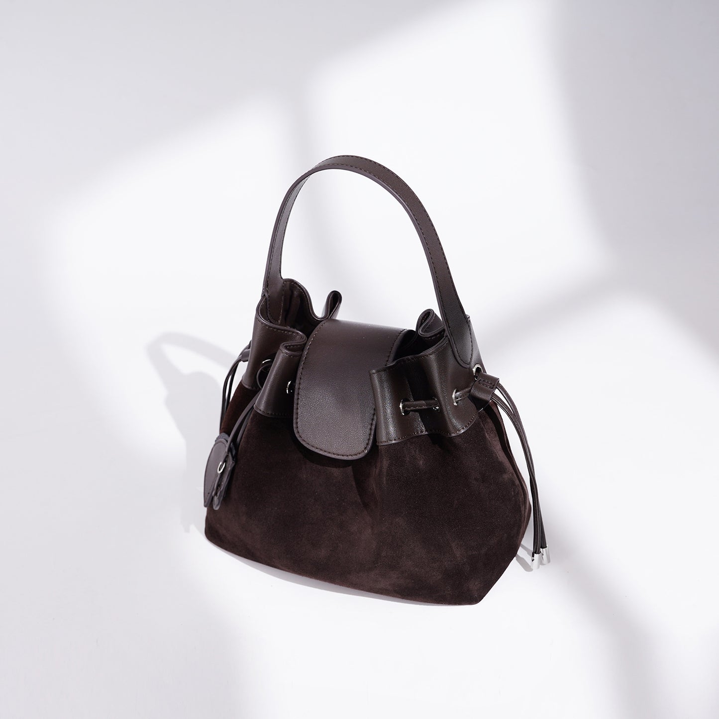 Chic Suede Leather Drawstring Bucket Bag with Horse Charm